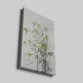 Framed canvas print of serene bamboo and leaves in a natural, soothing green and white palette