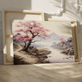 Framed canvas print of a serene cherry blossom landscape with mountains and a river