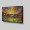 Framed canvas print of an impressionist football stadium with vibrant sunset hues