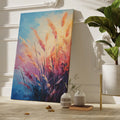 Framed canvas print of abstract pampas grass in sunset colours against a blue sky