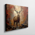 Framed canvas print of a majestic stag in an autumn forest with fiery red leaves