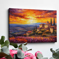 Framed canvas print of an Impressionist Tuscan landscape with a vibrant sunset sky, overlooking lavender fields and rustic houses.