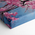 Framed canvas print of a bluebird perched on cherry blossom branches, with vibrant blue and pink hues