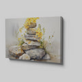 Framed canvas print of watercolour stones stacked with yellow flowers