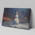 Framed canvas print of a snowman in a winter evening townscape with warm street lights and snowfall