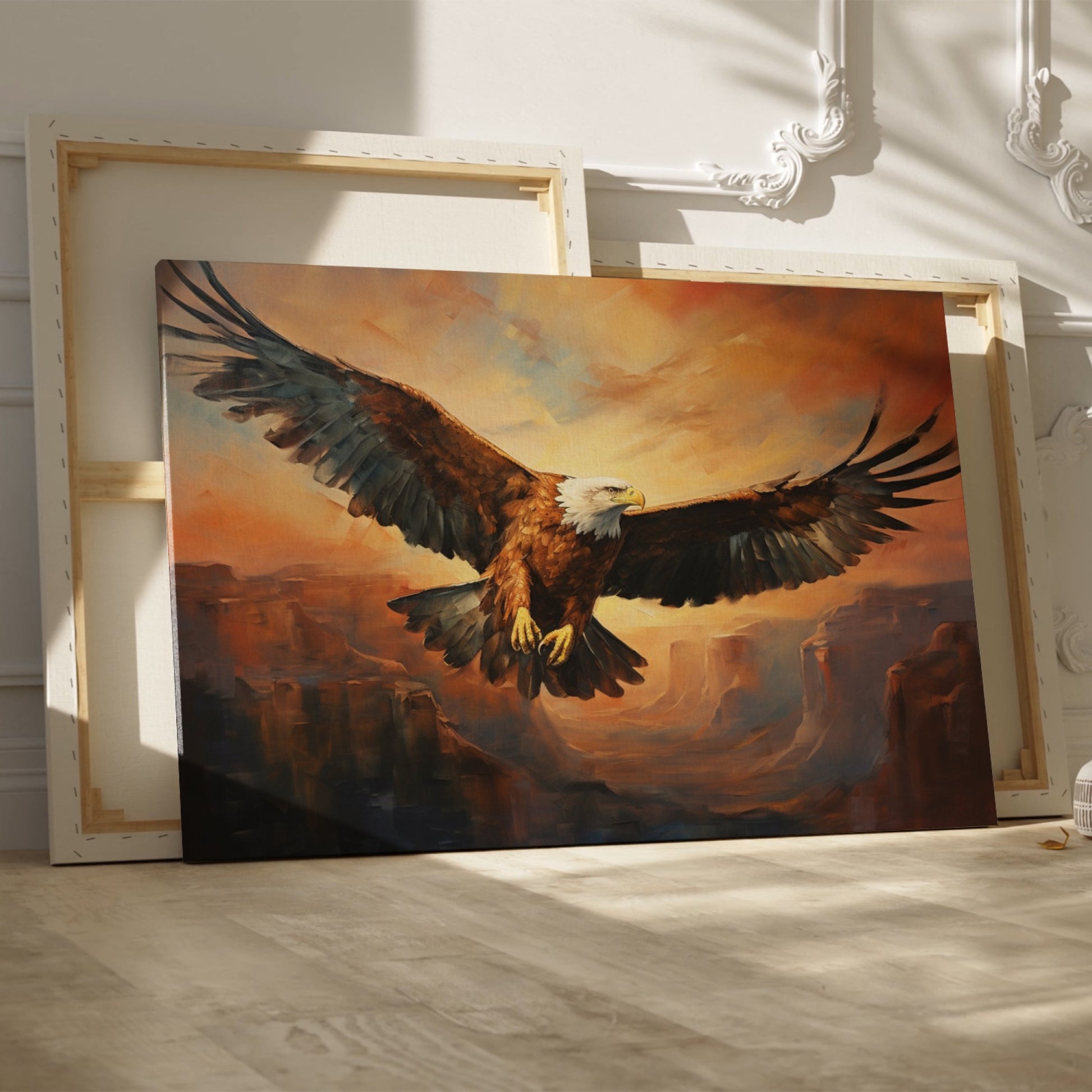 Framed canvas print of a majestic eagle flying over a canyon at sunset with warm golden and orange tones