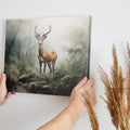 Framed canvas print of a majestic stag in a misty, ethereal forest with earthy tones