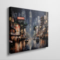 Framed canvas print of an urban street scene with illuminated pagoda and glistening rain-covered streets at night