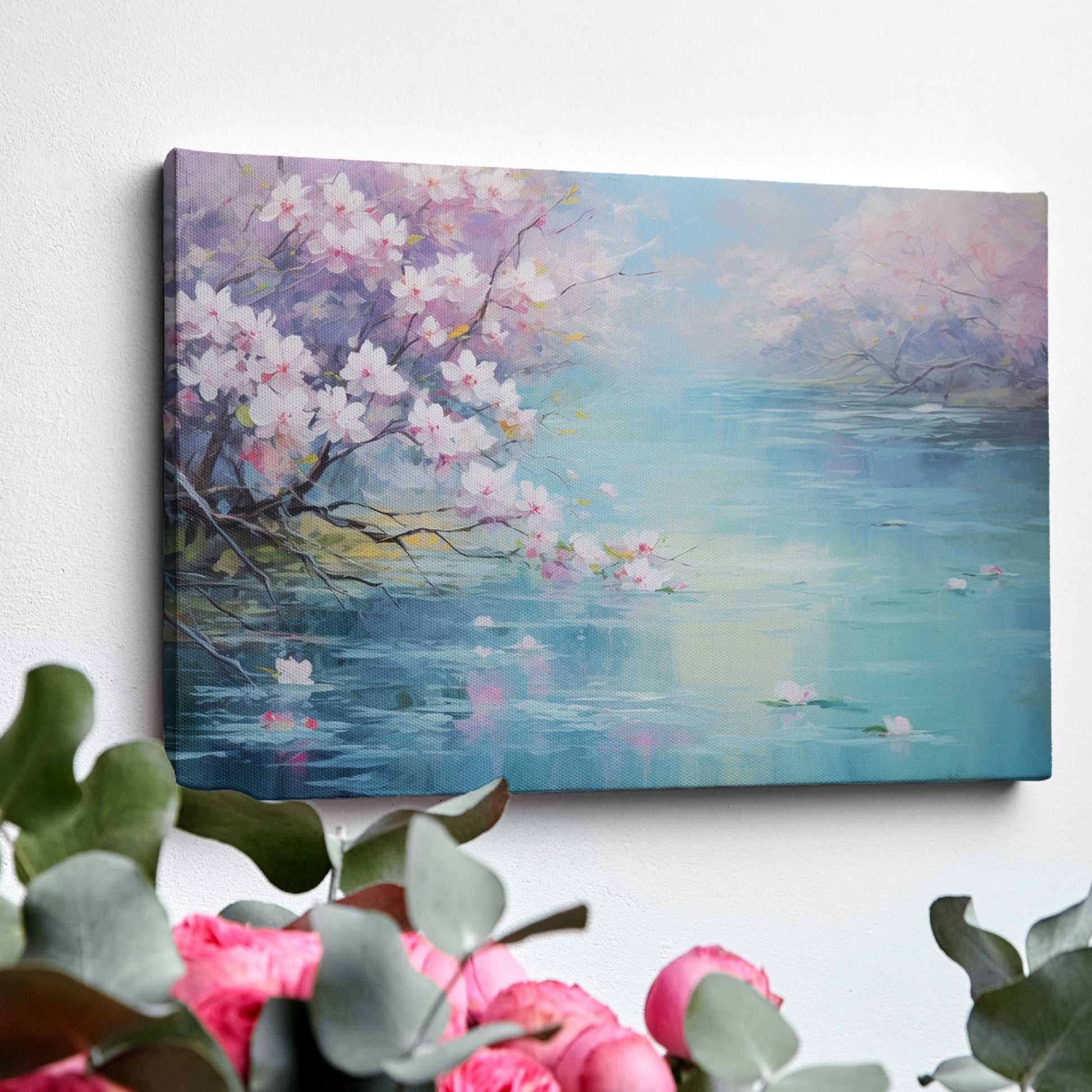 Framed canvas print of a serene landscape with cherry blossoms over tranquil waters