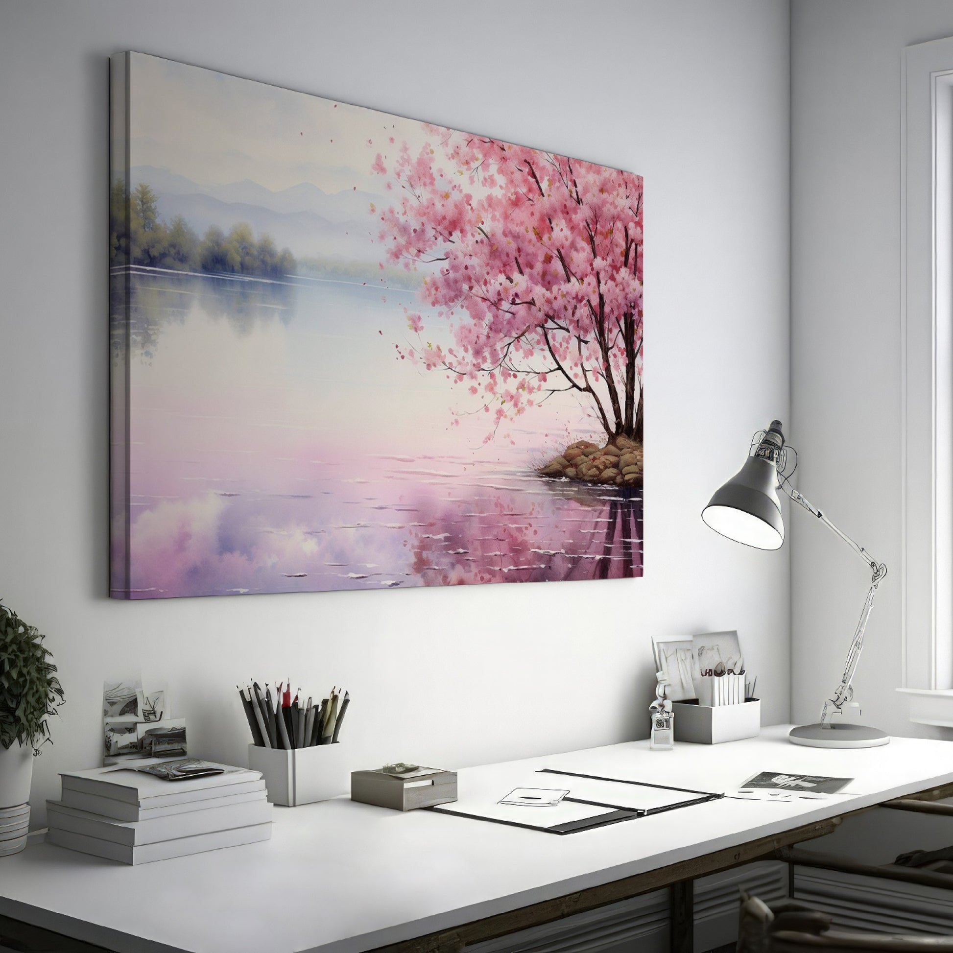 Framed canvas print of a serene cherry blossom tree by a quiet lake with pink and purple reflections