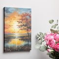 Framed canvas print of a picturesque autumnal sunset with vibrant orange sky and tree reflections on the water