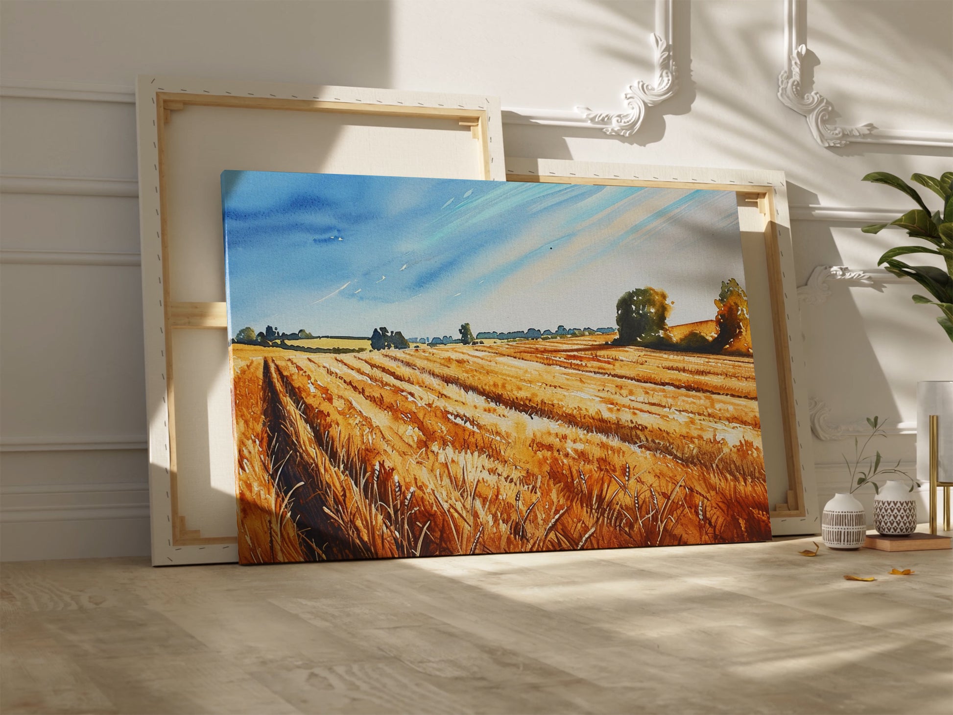 Framed canvas print of golden wheat fields under a blue sky in a rural landscape