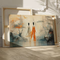 Framed canvas print of ethereal stylised women in a mystical, abstract landscape with orange and ivory tones