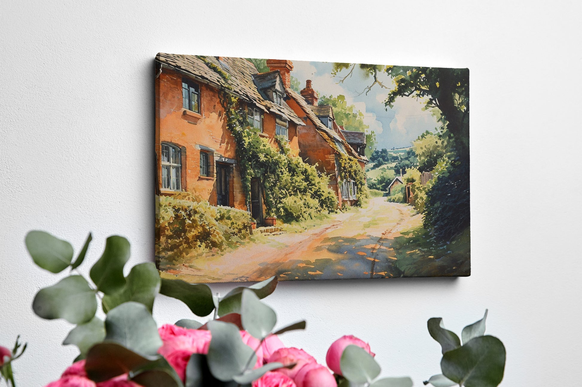 Framed canvas print of English cottage and countryside watercolour scene with lush greenery