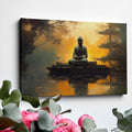 Framed canvas print of Buddha silhouette before an orange sunset with tree reflections on water