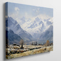 Framed canvas print of an impressionist painting featuring a snowy mountain landscape with an alpine village