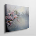 Framed canvas print of impressionist cherry blossoms overlooking a tranquil lake