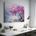 Framed canvas print of a cherry blossom tree by a lake with vivid pink flowers and tranquil blue waters