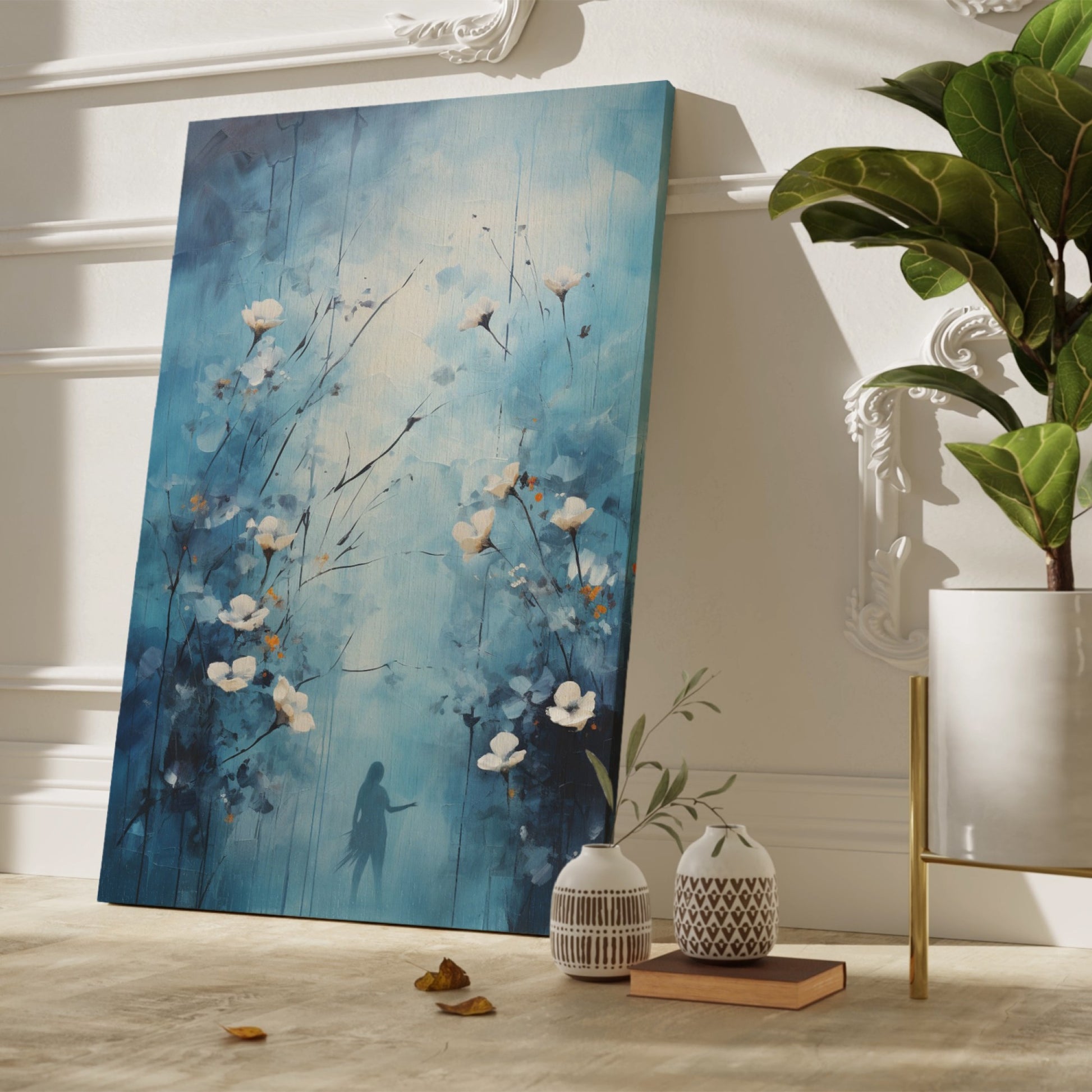 Framed canvas print of ethereal blue abstract painting with white flowers and a woman's silhouette