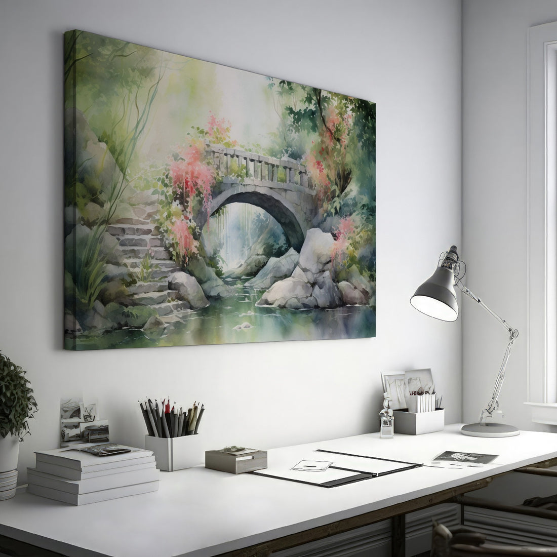 Framed canvas print of a serene stone bridge over a stream in a misty garden with lush greenery and flowering plants