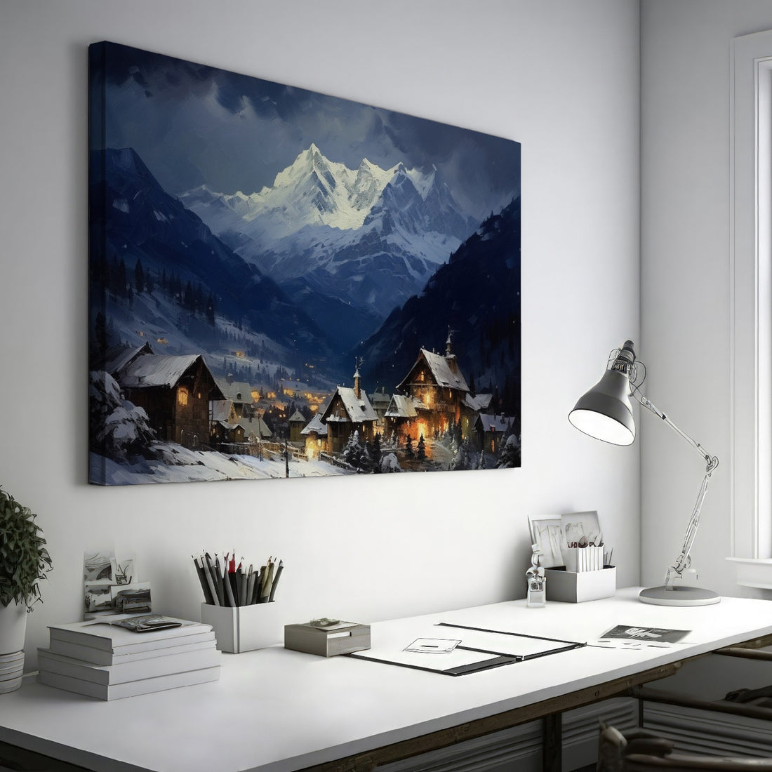 Framed canvas print of a snowy Alpine village with mountain backdrop and evening glow