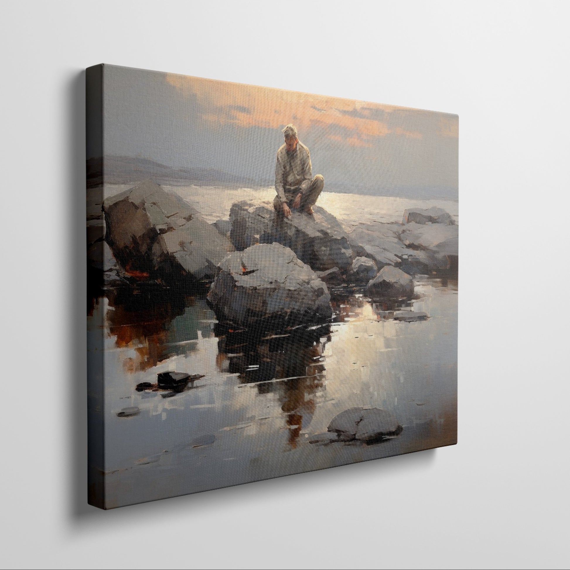 Framed canvas print of serene seascape with man sitting on rocks at sunset