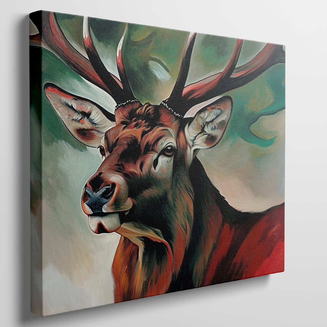 Framed canvas print of an expressive stag portrait with vibrant reds and abstract green background