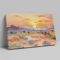 Framed canvas print of an impressionist painting depicting a desert sunset with warm colours