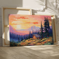 Framed canvas print of a colorful rustic cabin at sunset with vibrant sky and mountain background