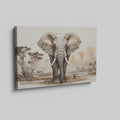 Framed canvas print of a realistic African elephant in a savannah landscape with acacia trees and soft beige tones