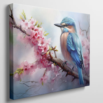 Framed canvas print of a vibrant kingfisher on a flowering cherry blossom branch