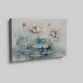 Framed canvas print of watercolour lotus flowers with pastel pink and blue tones