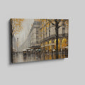 Framed canvas print of a Parisian streetscape with autumn leaves and rain