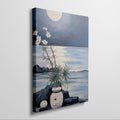 Blue and white moonlit seascape painting with flowers, rocks, and water