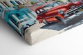 Framed canvas print of a vibrant Cuban street with vintage cars and colourful buildings