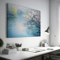 Framed canvas print of serene riverscape with cherry blossoms in impressionist style