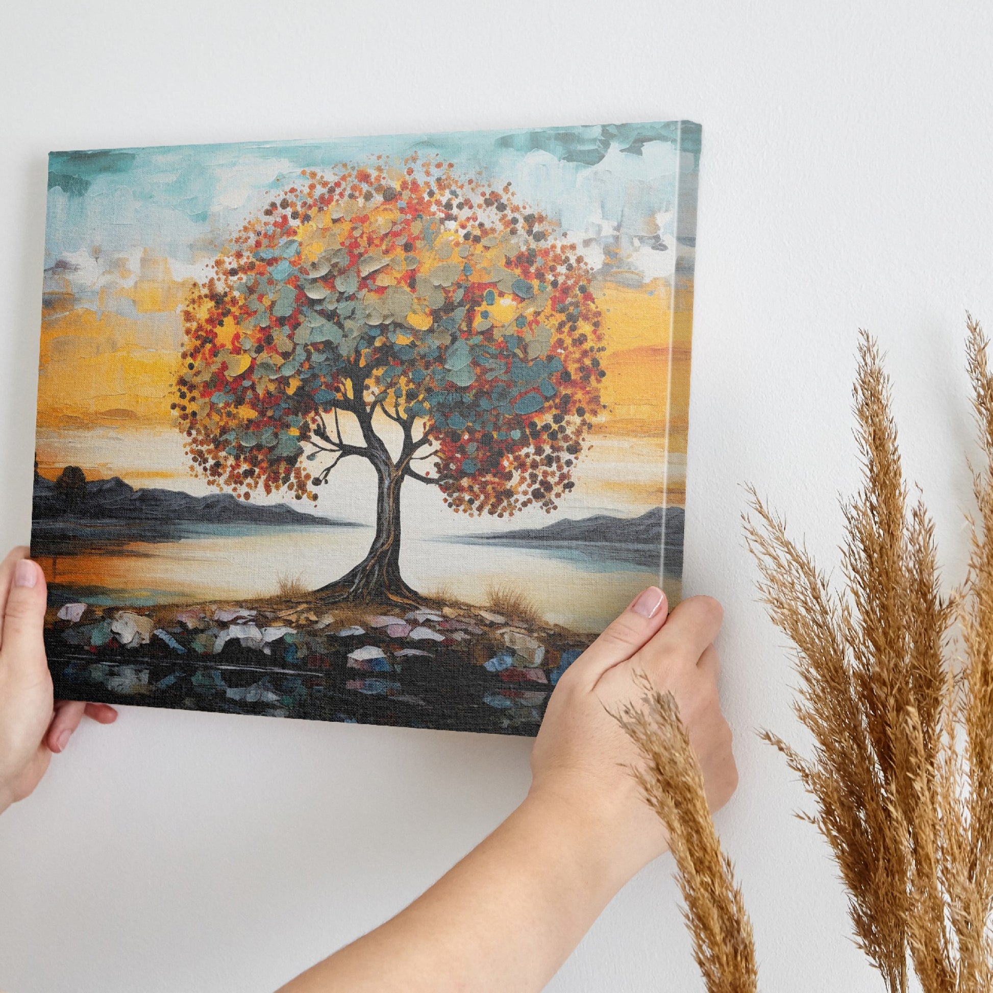 Textured canvas art of a tree with autumn leaves and a serene sunset in the background