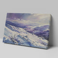 Framed canvas print of a snowy mountain landscape in watercolour with shades of purple and blue