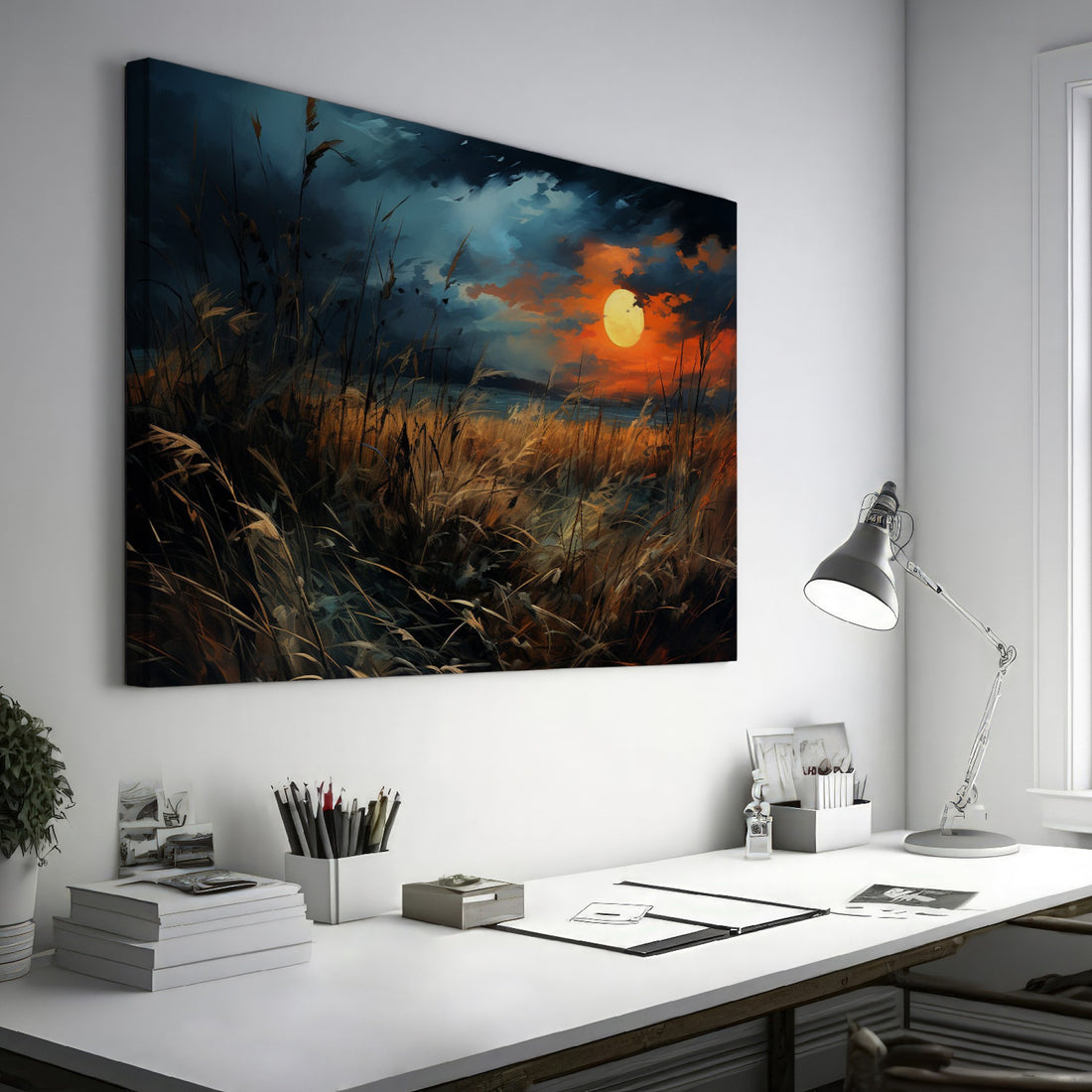 Framed canvas print of a dramatic sunset over a rustic meadow with vivid warm tones