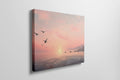 Framed canvas print of a serene seascape at sunset with flying birds and calm ocean waters