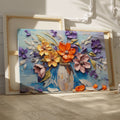 Framed canvas print of embossed and textured colourful flowers in impasto style