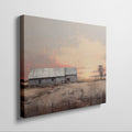 Framed canvas print of a rustic barn surrounded by tranquil fields at sunset, with warm golden and earthy tones.