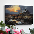 Framed canvas print of a rustic cottage with illuminated windows at sunset, set against a serene countryside landscape with a reflective creek.