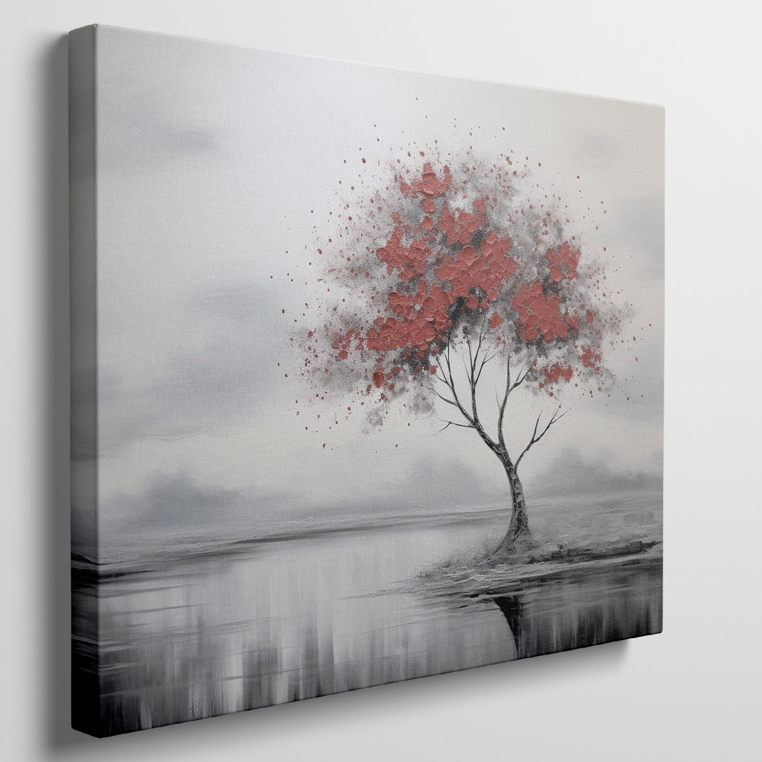 Canvas art featuring a solitary tree with red leaves against a soft gray and white background, reflecting in water below.