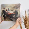 Framed canvas print of a classic Formula One race with vibrant orange racecar in dynamic motion