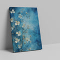 Framed canvas print of abstract blue flowers on a watercolour background