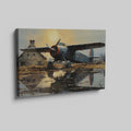 Framed canvas print of vintage airplane with warm sunset reflection on airfield