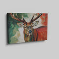 Framed canvas print of an impressionist stag portrait with vibrant red and green tones