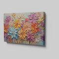 Framed canvas print of vibrant impasto flowers with 3D texture in bright colors