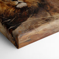 Framed canvas print of a realistic lion resting in the golden savannah